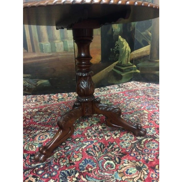 Item: Antique Empire Tilt Top Table in Mahogany. Age & Condition: Circa 1840. Refinished and restored. Dimensions: 33″...