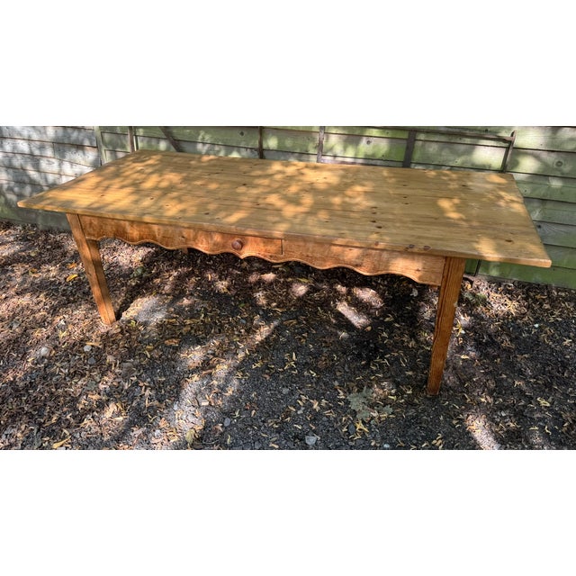 A larger Pine Farmhouse Dining Table, having single drawer to front and original colour and patina. A good end overhang...