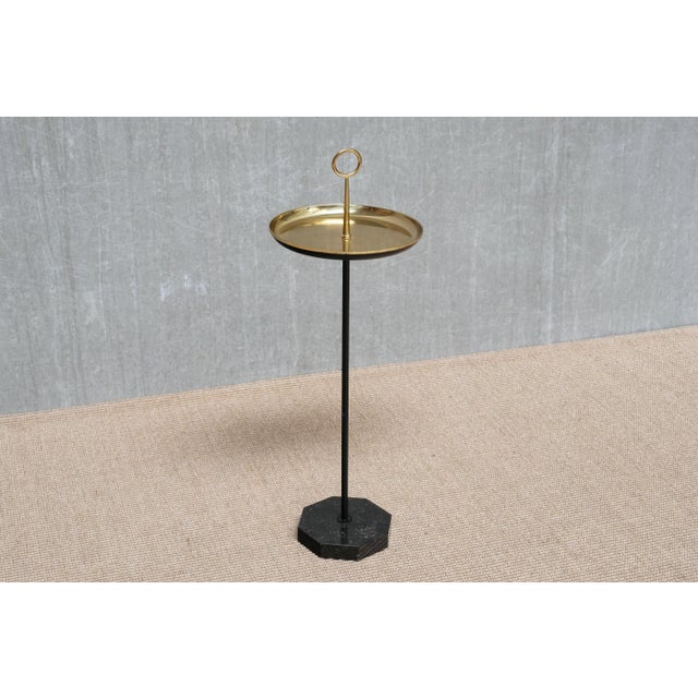 This rare side or drinks table was designed by Gunnar Ander and produced by Ystad Metall in Sweden during the 1950s. The...