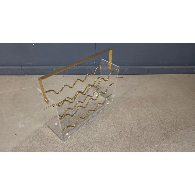 Vintage Acrylic Glass and Brass Magazine Holder, 1970s, in Very Good conditions. Designed 1970 to 1979