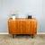 A simple yet elegant sideboard – made in Germany with beautiful details such as the period-typical, tapered legs in dark...