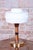 This 1960s table lamp is a stylish example of Czechoslovak design, which skillfully combined various materials at the time...