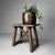 Discover the timeless charm of this decorative wooden stool from the 1920s. with its beautiful, weathered patina and...
