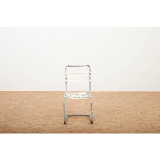 Children's Chair with Galvanized Tubular Steel Frame and White-Painted Wooden Slats, 1930s, in Worn conditions. Designed...