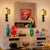 Pair of mid century modern Murano glass and brass sconces, Italy 1980s. The Italian sconces are made of a large gold...