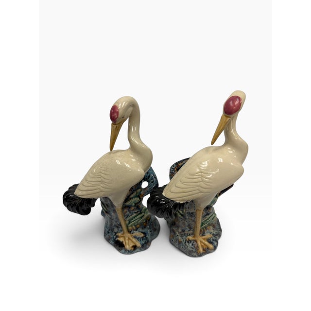 Elevate your interior with this striking pair of early-to-mid 20th-century Chinese export ceramic crane figurines,...