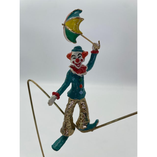 Celebrate the artistry of renowned American sculptor Ron Lee with this charming High Wire Circus Clown sculpture, hand-...