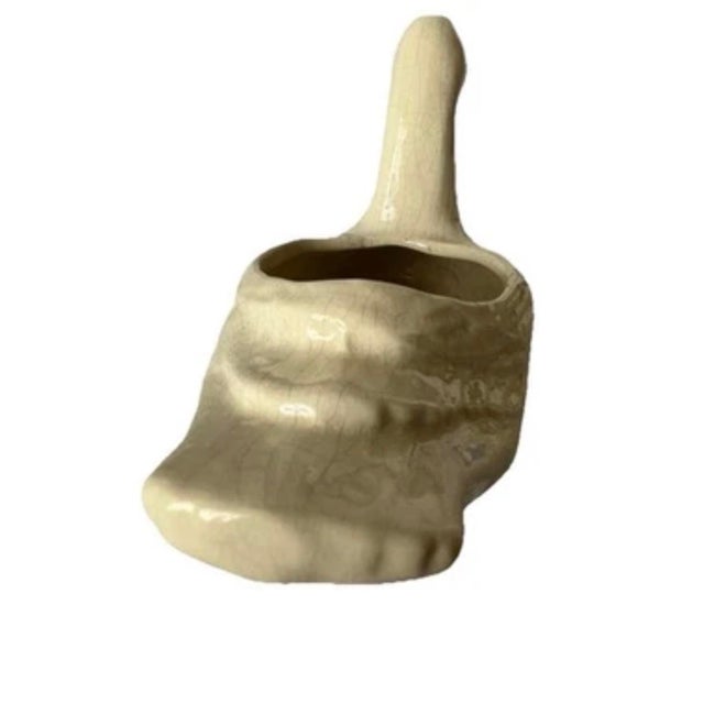 Vintage mid 20th century ceramic swan planter. Perfect for displaying succulents. It is a creamy white color with textured...