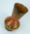 French Mid Century vase from St. Clément. Model number 9090. Beautiful combination of 2 glazes: lava glaze in red, orange...