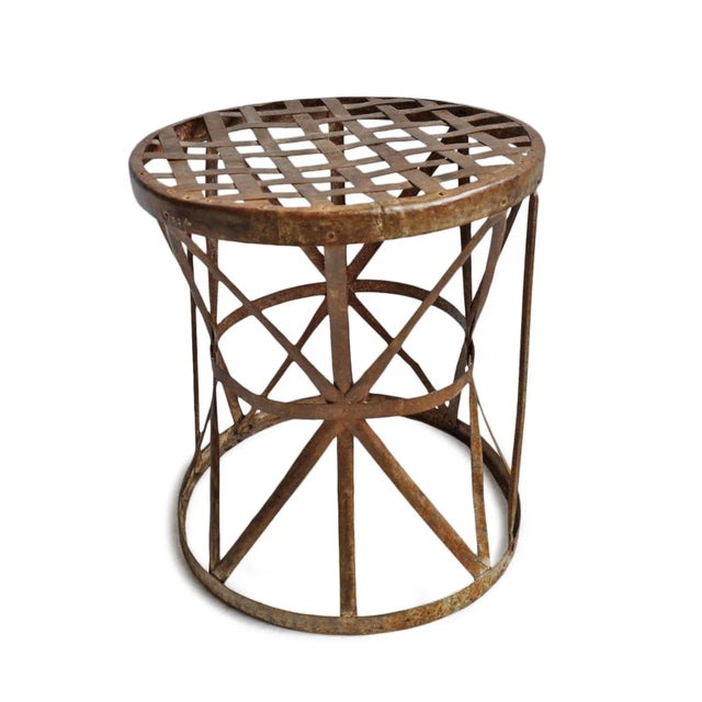 Vintage industrial iron strap stool. Rustic aged patina great for outdoor or indoor use.