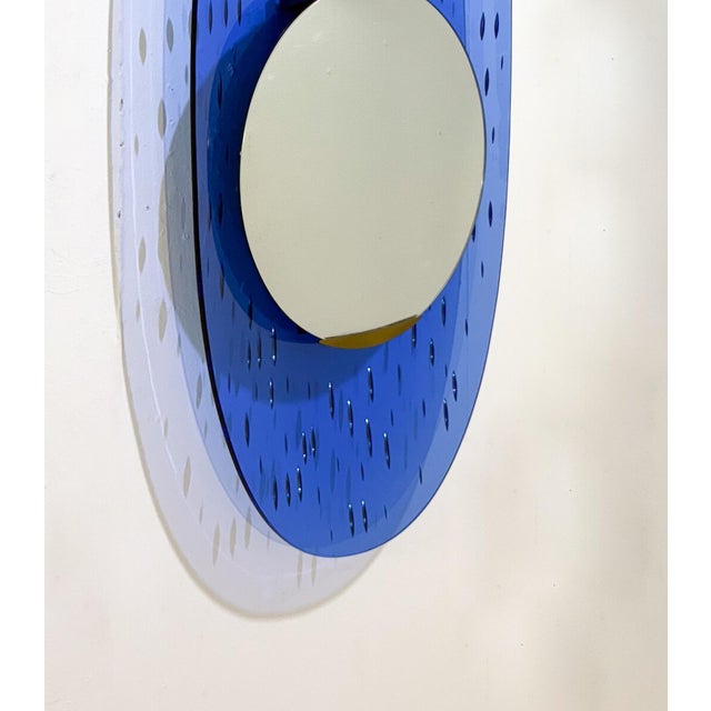Blue Glass Mirror by Ettore Sottsass for Santambrogio & de Berti, Italy, 1950s This piece is attributed to the mentioned...