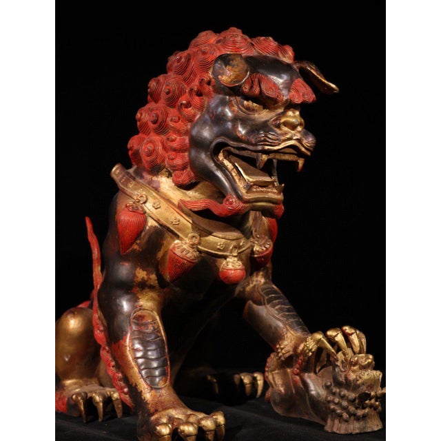 This is a monumental pair of vintage gilt bronze guardian lions, referred to as "Grand Beijing Lions," featuring striking...