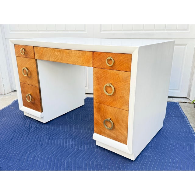 Mid century modern desk designed by T.H. Robsjohn-Gibbings for Widdicomb. The desk has been restored with a two tone...