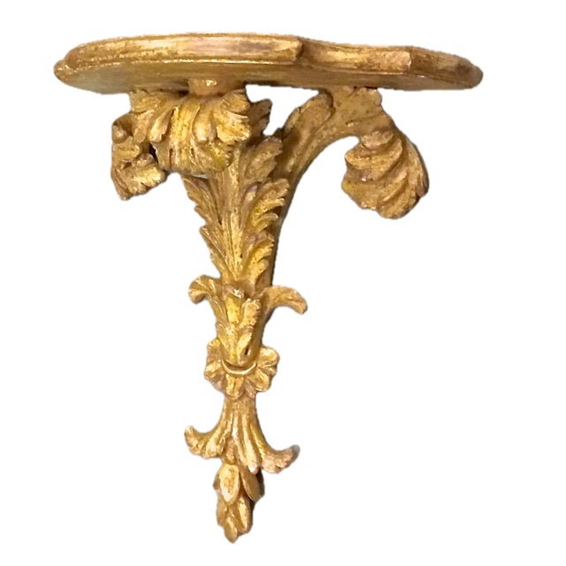 Vintage Italian carved giltwood acanthus leaf wall shelf. Marked "Made in Italy, 485P" on the back side. Light wear.