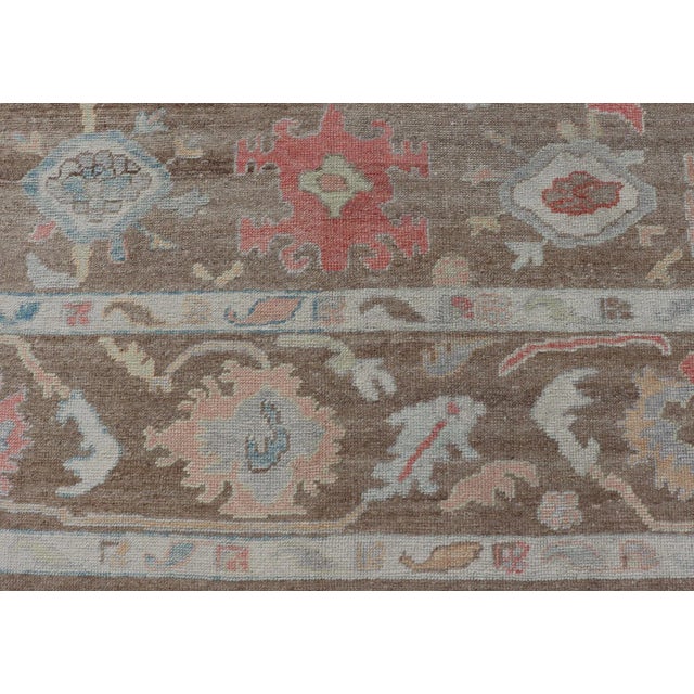 Turkish Oushak Rug With All-Over Floral Design on a Light Brown Field For Sale - Image 11 of 12