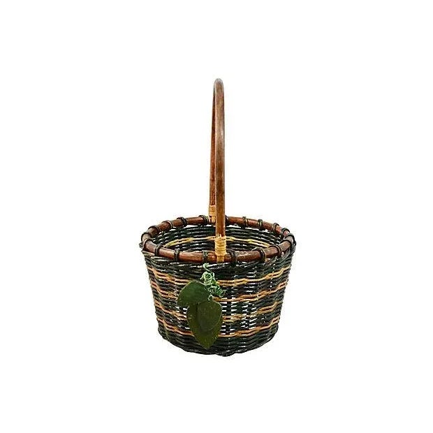 Large vintage 10 inch round green and natural tan woven rattan basket with wood handle, frame and hanging spring leaf...