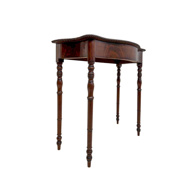 Elegant console table from 1940-1950. Made from flower mahogany wood. Stylish design and very good quality. The front has...