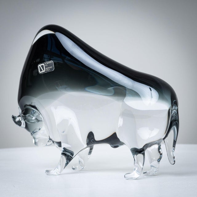 Smoked glass sculpture of a buffalo rearing. Label on the underside “V. Nason & C. Murano Italy”.