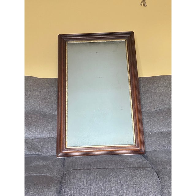 Beautiful antique late Victorian rectangular wall mirror featuring a deep-molded walnut hardwood frame and a tarnished...