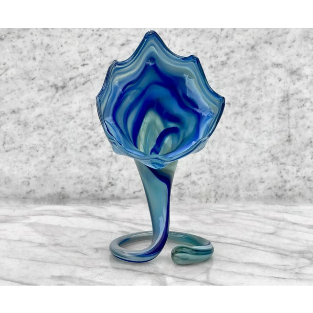 A Hand Blown Art Glass Sculpture Vase by Sooner Glass Company, United States, c. Mid 20th Century. This Sculpture Vase...