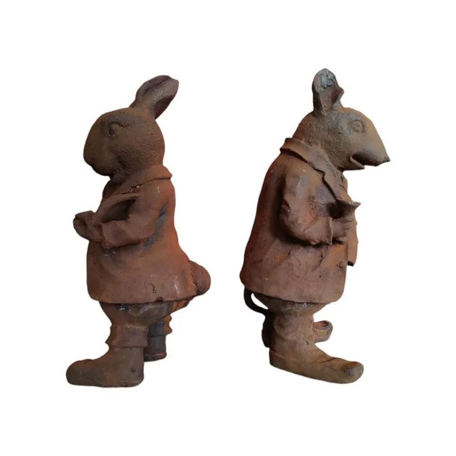 Pair of iron figures. 50's garden figures in wrought iron. Measure 45 cm high. Good condition This piece is attributed to...