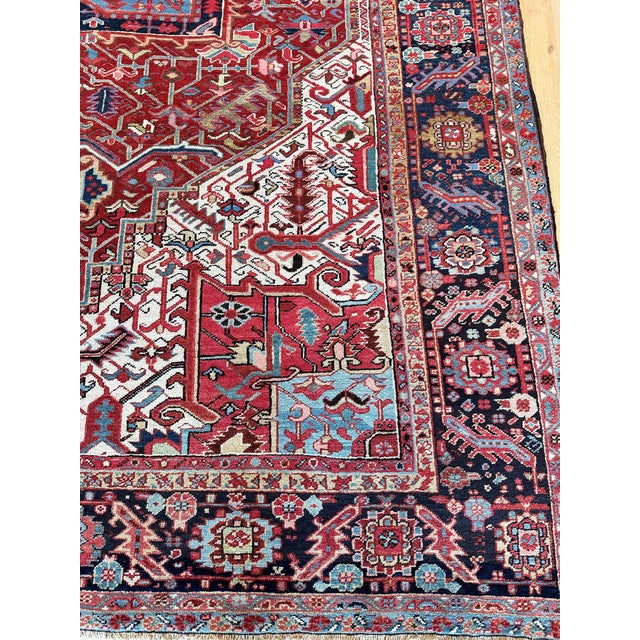This magnificent Heriz carpet, woven in the 1920s in Northwest Persia, showcases a striking blend of vibrant colors and...