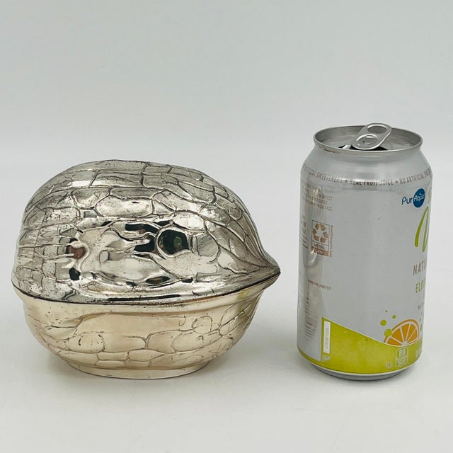 Beautiful 1970s silverplate trinket box in the shape of a walnut, with a gleaming gold-plated? interior. Made in Japan,...
