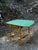 A darling Vintage & Antique enamel top kitchen table form the late 1930's / early 40's, with a painted wooden base that...