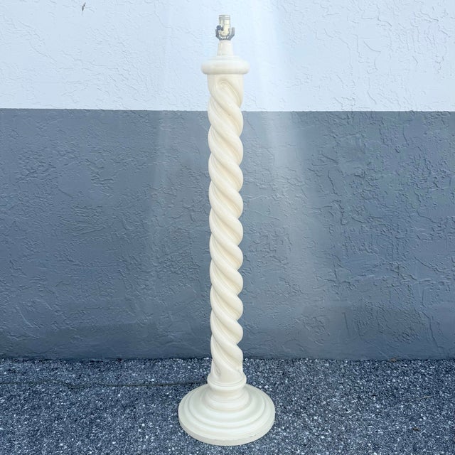 This sculptural Postmodern floor lamp showcases a dramatic spiral twist design inspired by classical barley twist columns,...