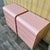 A pair of Vintage Custom Made Postmodern Pink Waterfall Formica Nightstands. Circa 1980s Features three drawers with...