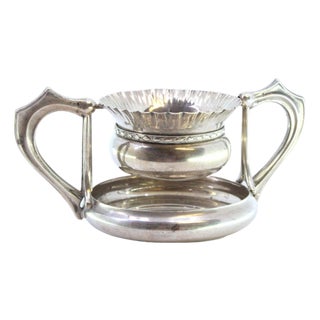 Silver Tea Strainer with Embossed Cup-Shaped Reservoir and Grooved Handles For Sale