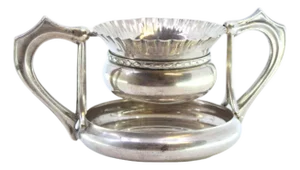 Silver Tea Strainer with Embossed Cup-Shaped Reservoir and Grooved Handles
