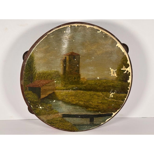Antique Folk Art Hand Painted Scenic Tambourine for your consideration. The tambourine measures approx. 12 1/8 inches in...