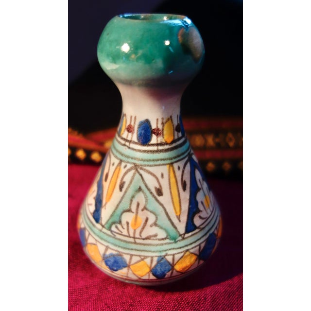 Bright Moorish designs on this little antique Morrocan vase. Gold, green, blue, black and white curvy handpainted...