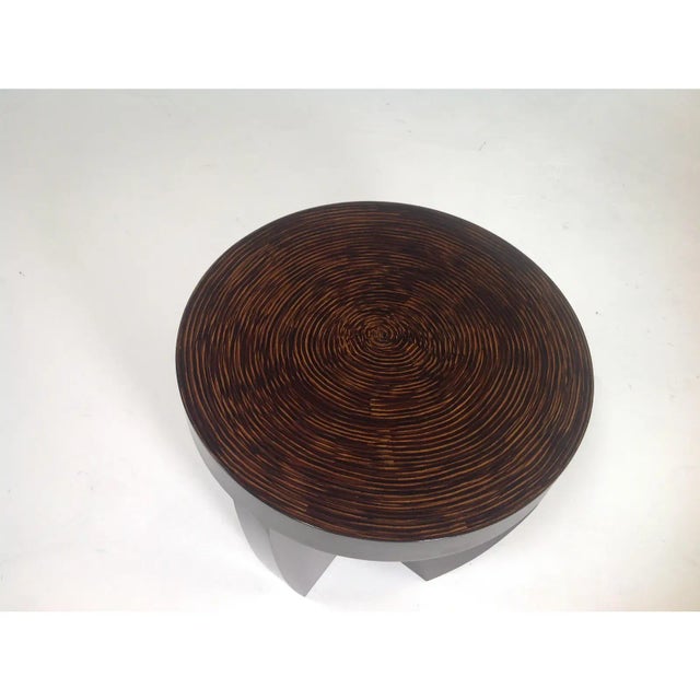 Modern round end table with Zembrano finish. Table is quite unique and ready to enjoy. Unique modern end table with fun...