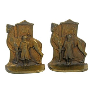 Pair of Antique Cast Iron Camel Driver & Camel Bookends For Sale