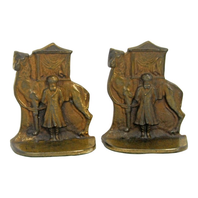 Pair of Antique Cast Iron Camel Driver & Camel Bookends For Sale
