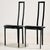Postmodern dining chairs designed by Maurizio Cattelan for Cattelan in the 1980s. with a sculptural metal backrest and a...