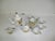 A porcelain hand-painted white and gold Sunray Kutani dragon ware Japanese 15 pc tea service. The set consist of 6 cups, 6...