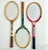 This is a set of Vintage Wilson Wood Tennis Rackets from the 1950-1970s. The green racket is the oldest and has chippy...