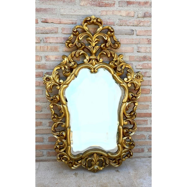Antique gold cornucopia mirror. By unknown manufacturer from France, circa S.XX In original condition, with minor wear...