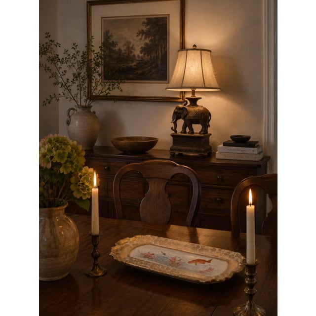 Bring timeless elegance and worldly charm into your home with this striking vintage elephant table lamp. Featuring a...