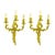 A pair of Louis XV-style gilded bronze sconces, featuring vegetal and shaped branches with three arms terminating in beige...