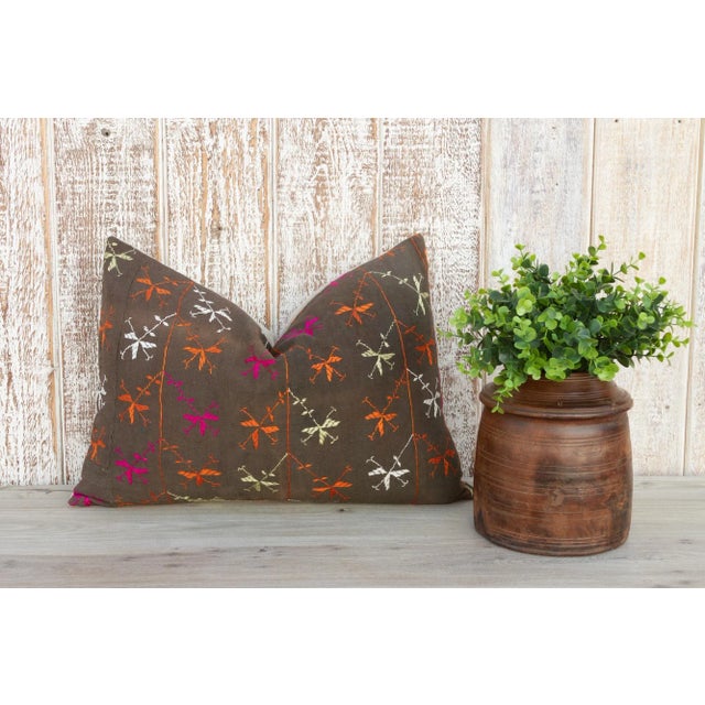This colorful and luxurious Bagh Phulkari pillow features beautiful hand-done silk embroidery on top of a cotton fabric....