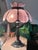 This 1970's lamp features a stunning, hand-curved pink marbled art glass shade formed into delicate lotus/tulip petals...