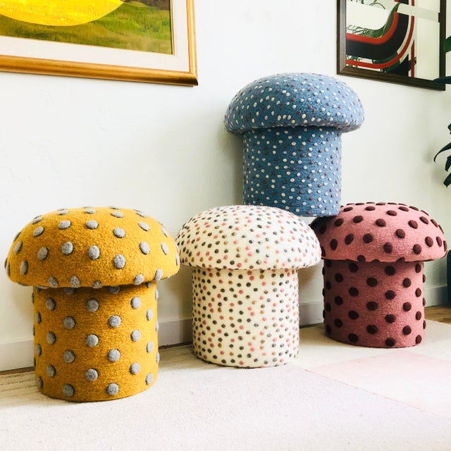 A handmade mushroom shaped ottoman, upholstered in a dotted wool blend fabric. Perfect for using as a footstool or extra...