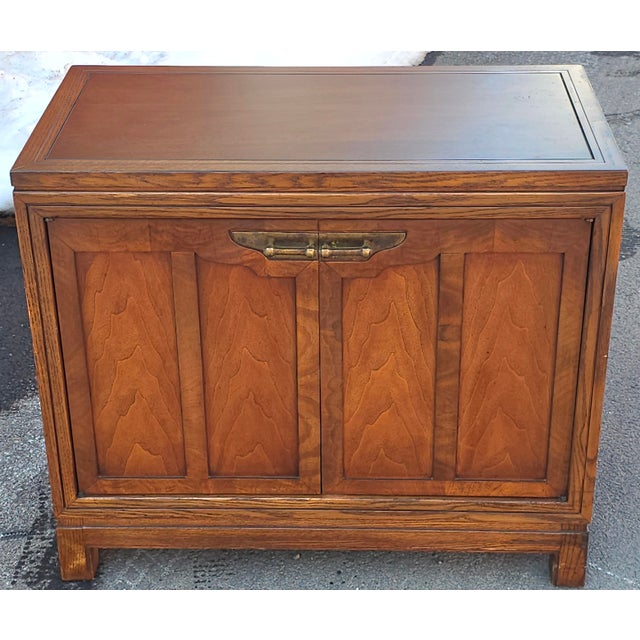 Mid-Century Fancher Furniture Walnut and Oak Side Cabinet. Loose shelf. Measures 34" in width, 18" in depth and 39.25" in...