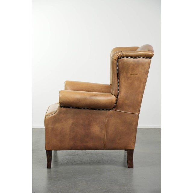 1990s Light Cowhide Wing Armchair with a Timeless English Look and Good Seating Comfort For Sale - Image 5 of 14