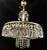 Cut crystal chandelier from the 1970s for 3 light points. Very dense, rich in crystals. Containing 24% Pbo, it is not a...