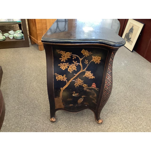 Black Bombe Chinoiserie chest with three large drawers. Marble top with antiqued brass pulls.